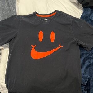 Nike Black Tee with Vibrant Orange Smile
